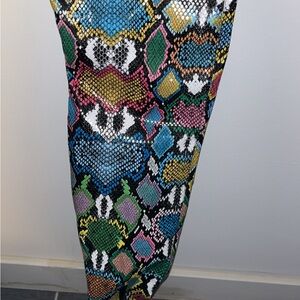 Steve Madden Multicolor Snake Print Heeled Boots with zippers on side.